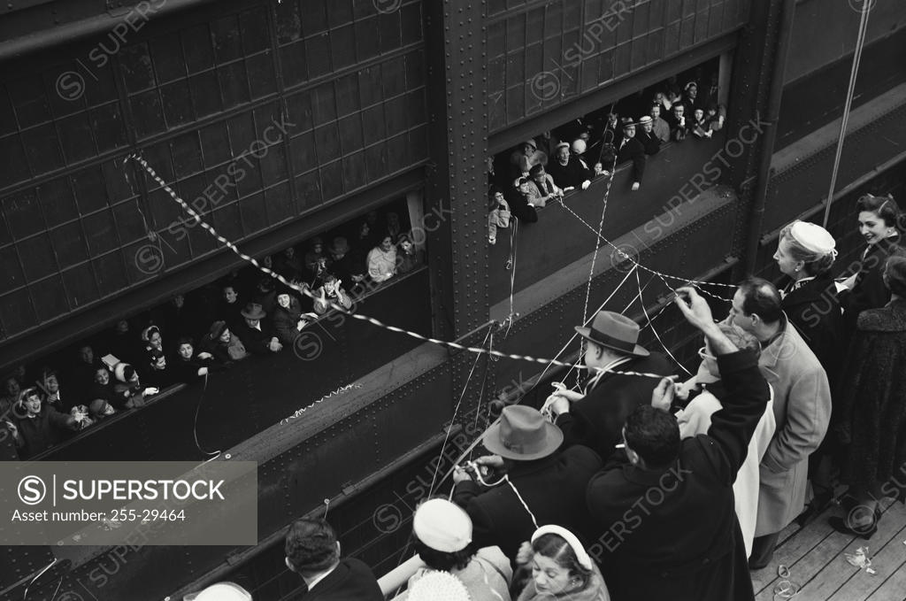 Stock Photo: 255-29464 Group of people standing near a departing cruise ship, New York City, New York State, USA