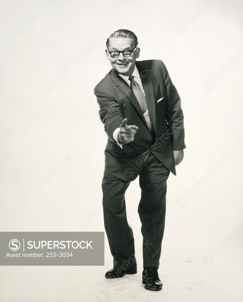 Stock Photo: 255-3034 Portrait of a businessman pointing forward