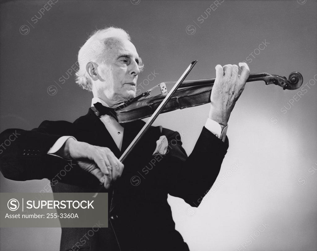 Stock Photo: 255-3360A Close-up of a violinist playing a violin