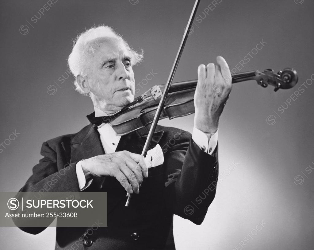 Stock Photo: 255-3360B Close-up of a violinist playing a violin