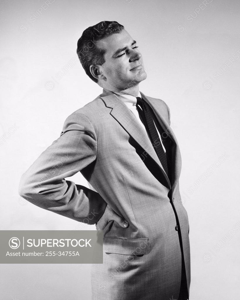 Stock Photo: 255-34755A Mid adult man suffering from a backache
