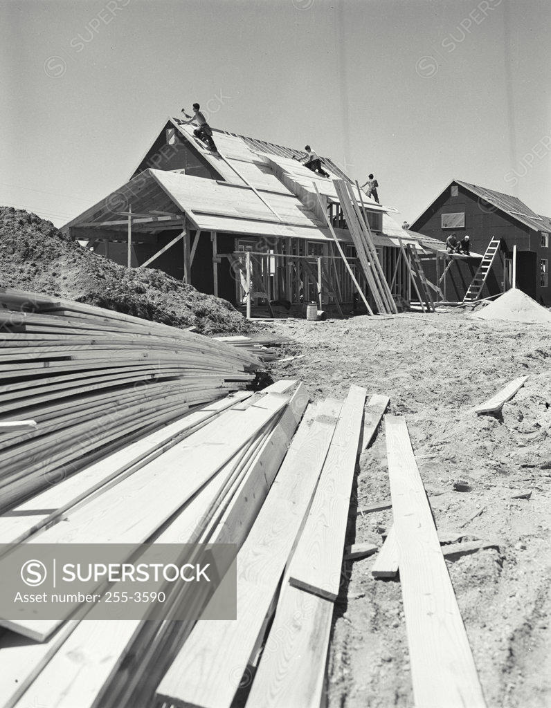 Stock Photo: 255-3590 Construction workers building a house