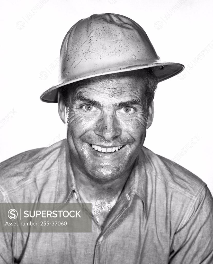 Stock Photo: 255-37060 Close-up of a male construction worker smiling