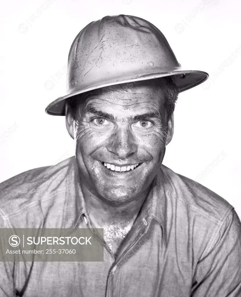 Close-up of a male construction worker smiling