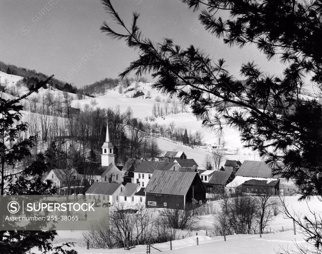 Stock Photo: 255-38065 USA, Vermont, East Corinth, houses on snow covered landscape