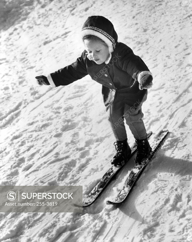 Stock Photo: 255-3819 High angle view of a girl skiing on snow