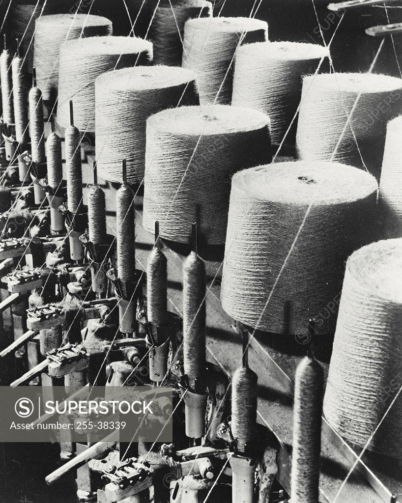 Stock Photo: 255-38339 Spools of thread in textile factory