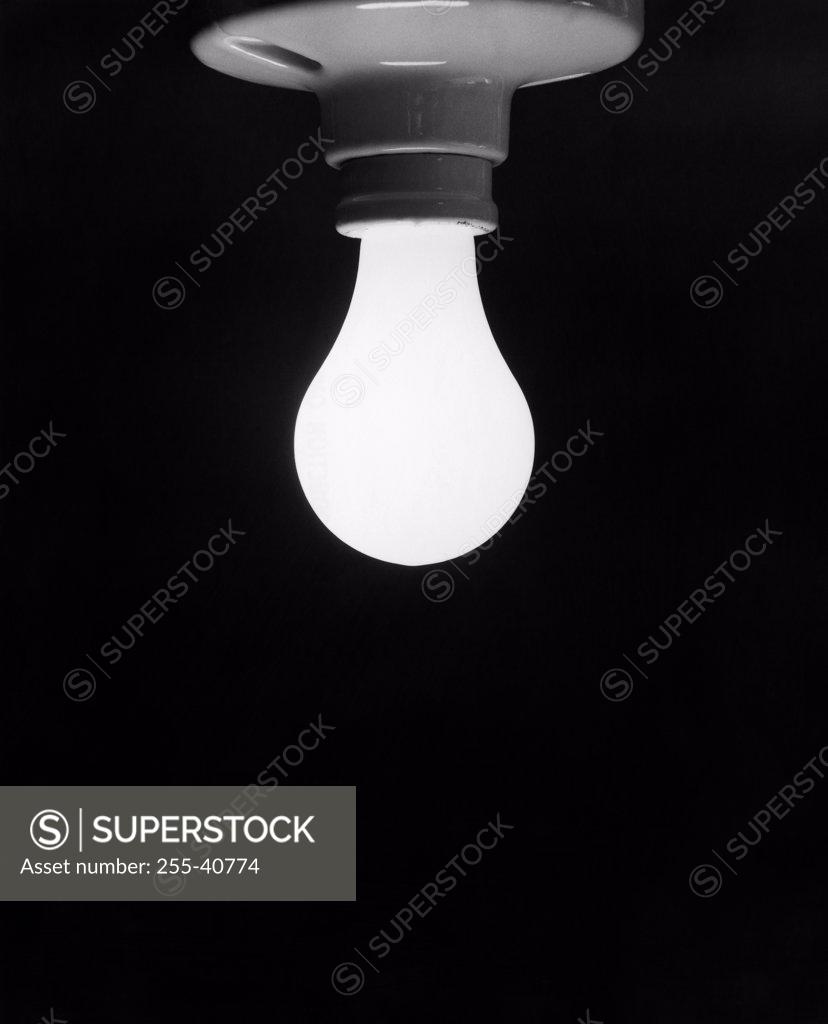 Stock Photo: 255-40774 Close-up of a lit light bulb
