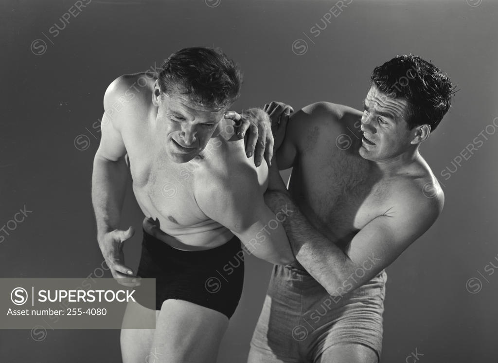 Stock Photo: 255-4080 Two mid adult men wrestling