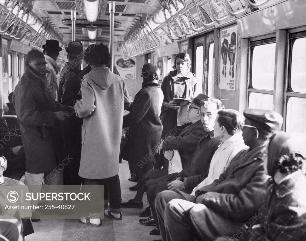 Stock Photo: 255-40827 Passengers traveling in a commuter train