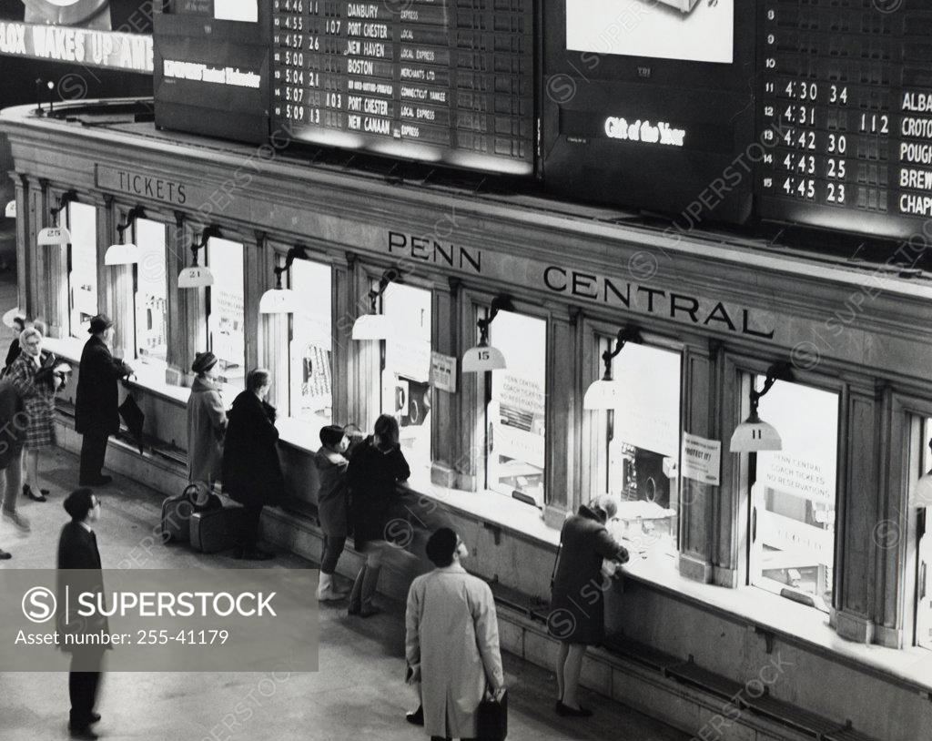 Stock Photo: 255-41179 Group of people standing at ticket counter, Grand Central Terminal, New York City, New York, USA