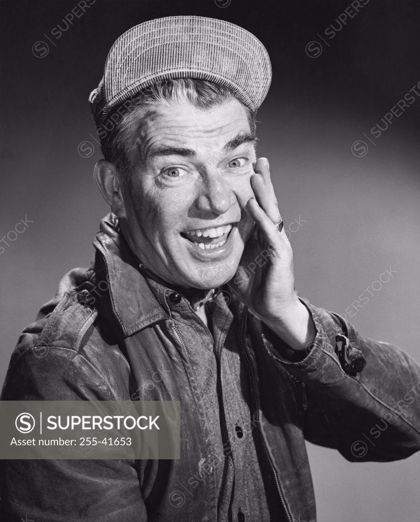 Stock Photo: 255-41653 Portrait of a mature man laughing
