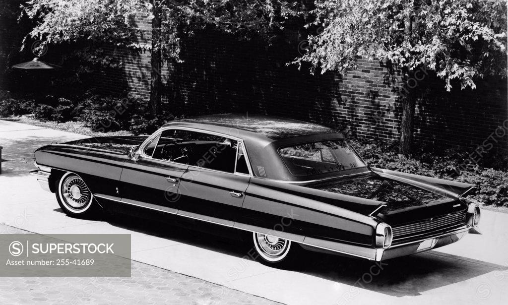 Stock Photo: 255-41689 High angle view of a sedan on a driveway, 1962 Fleetwood Sixty Special