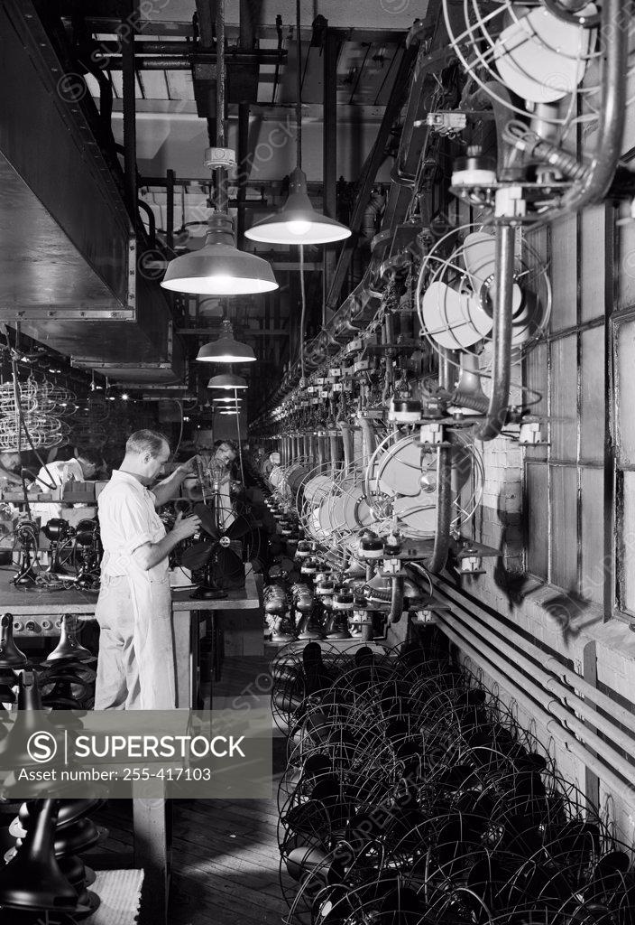 Stock Photo: 255-417103 USA, Massachusetts, Springfield, Westinghouse Electric Corporation, View of fan assembly line