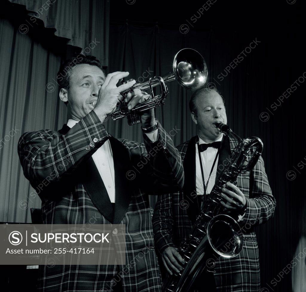 Stock Photo: 255-417164 Two men playing on stage