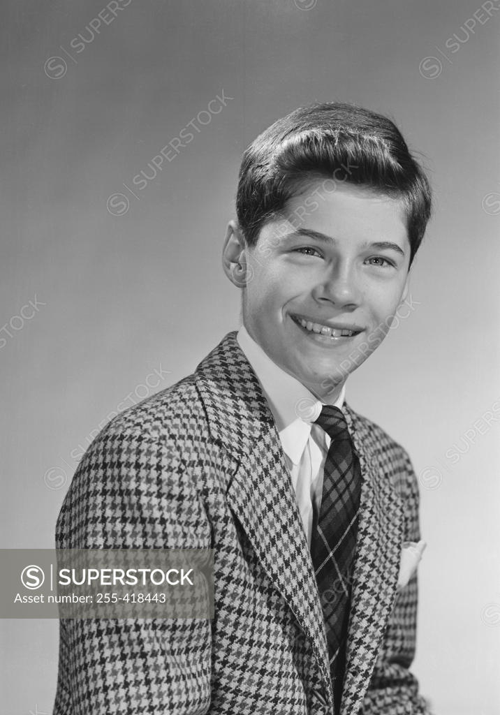 Stock Photo: 255-418443 Portrait of boy in pepita jacket and tie