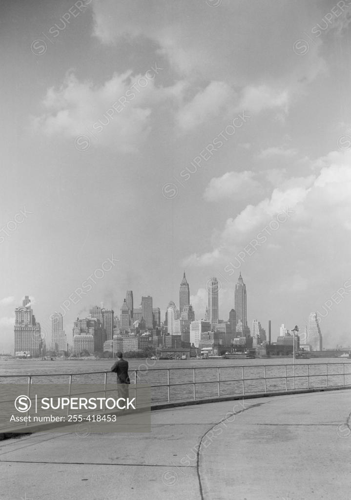 Stock Photo: 255-418453 USA, New York, New York City, Manhattan skyline seen across East River