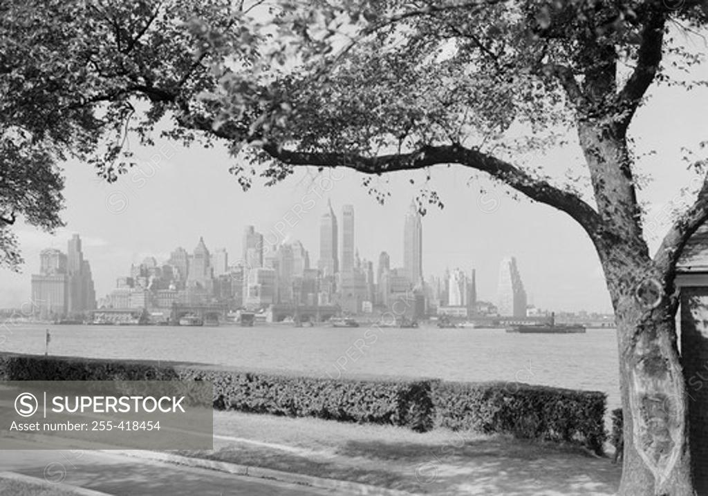 Stock Photo: 255-418454 USA, New York, New York City, Manhattan skyline seen across East River