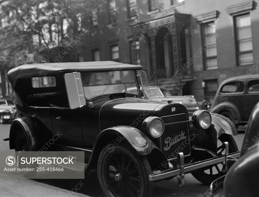 Stock Photo: 255-418466 Vintage Buick parked on street