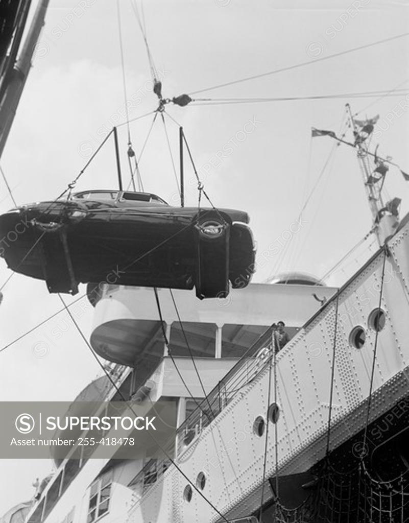 Stock Photo: 255-418478 Hanging car is transporting on ship