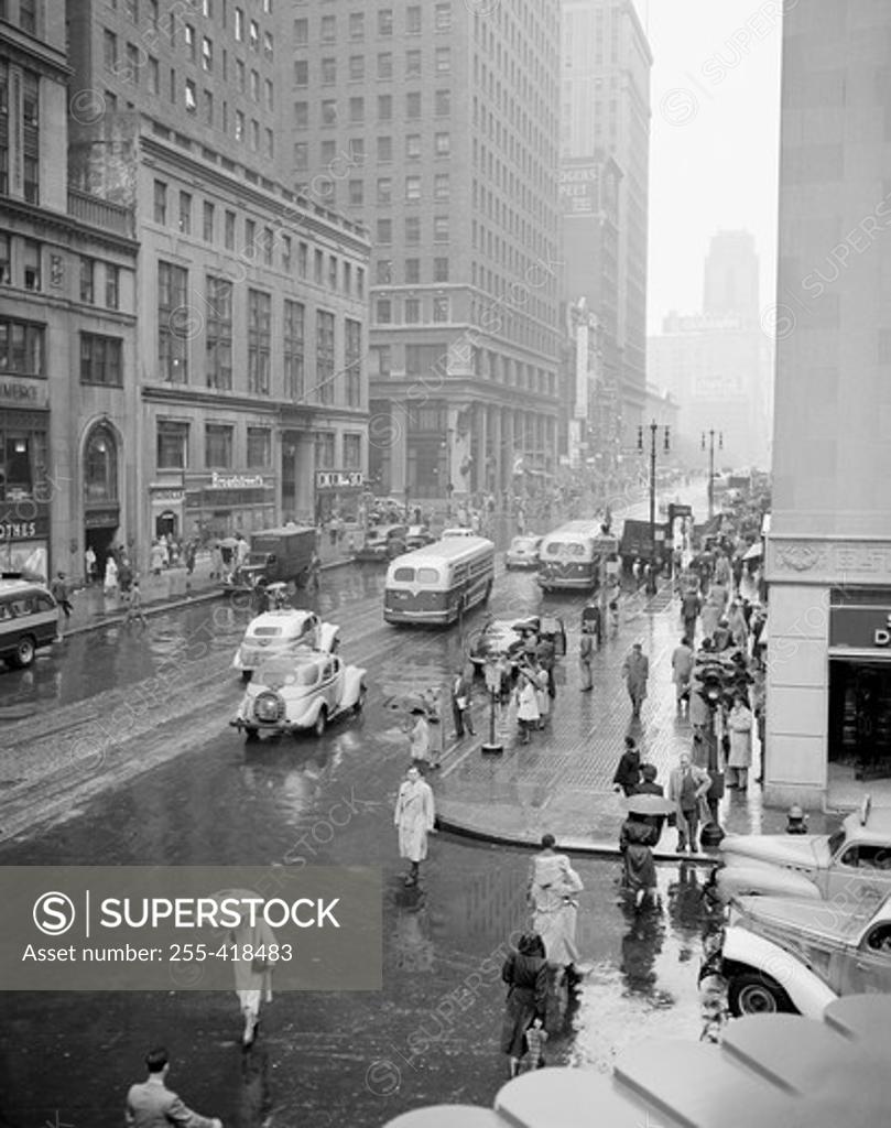 Stock Photo: 255-418483 USA, New york State, New York City, high angle view on street with traffic and people walking