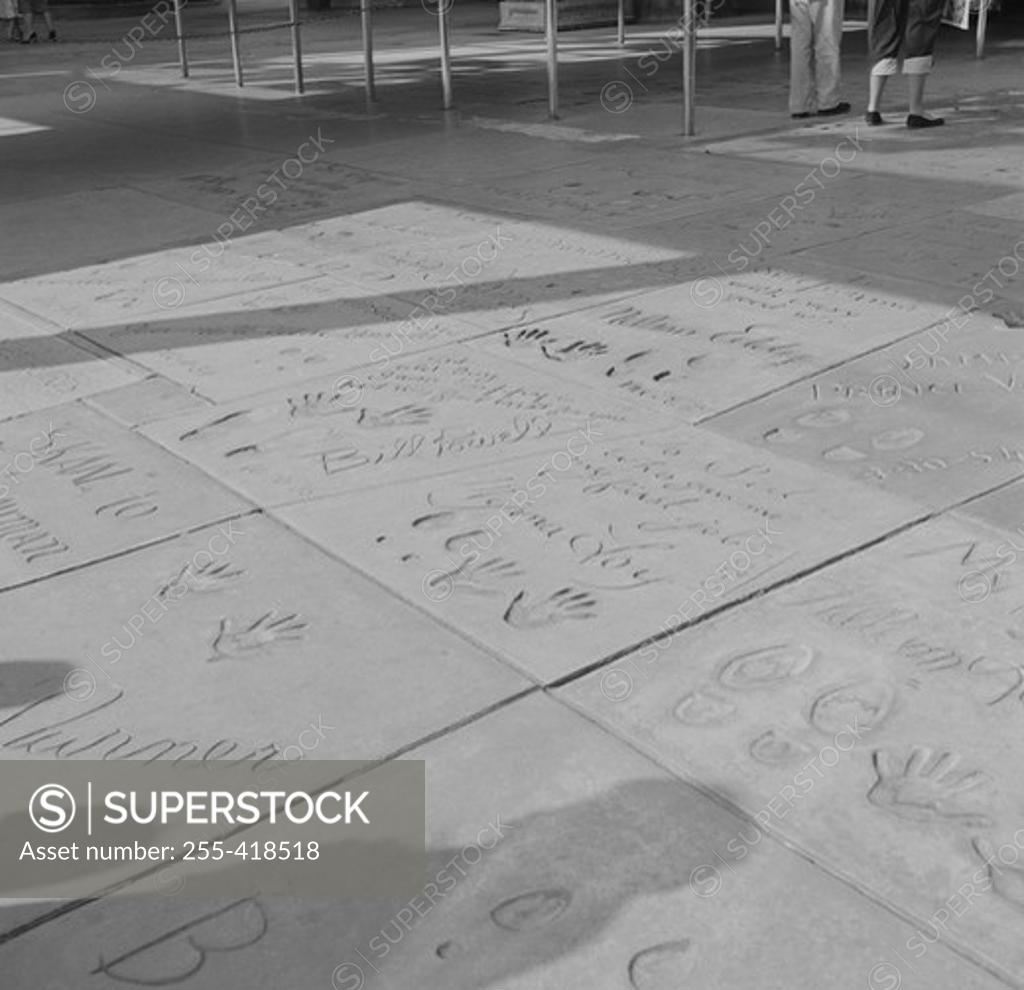 Stock Photo: 255-418518 USA, California, Los Angeles, Hollywood, imprints of movie stars made in cement at Grauman's Chinese Theatre on Hollywood Boulevard