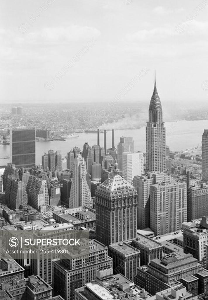 Stock Photo: 255-419801 USA, New York State, New York City, Roof view looking Southeast from radio city with Chrysler Building and United nations buildings toward Long Island