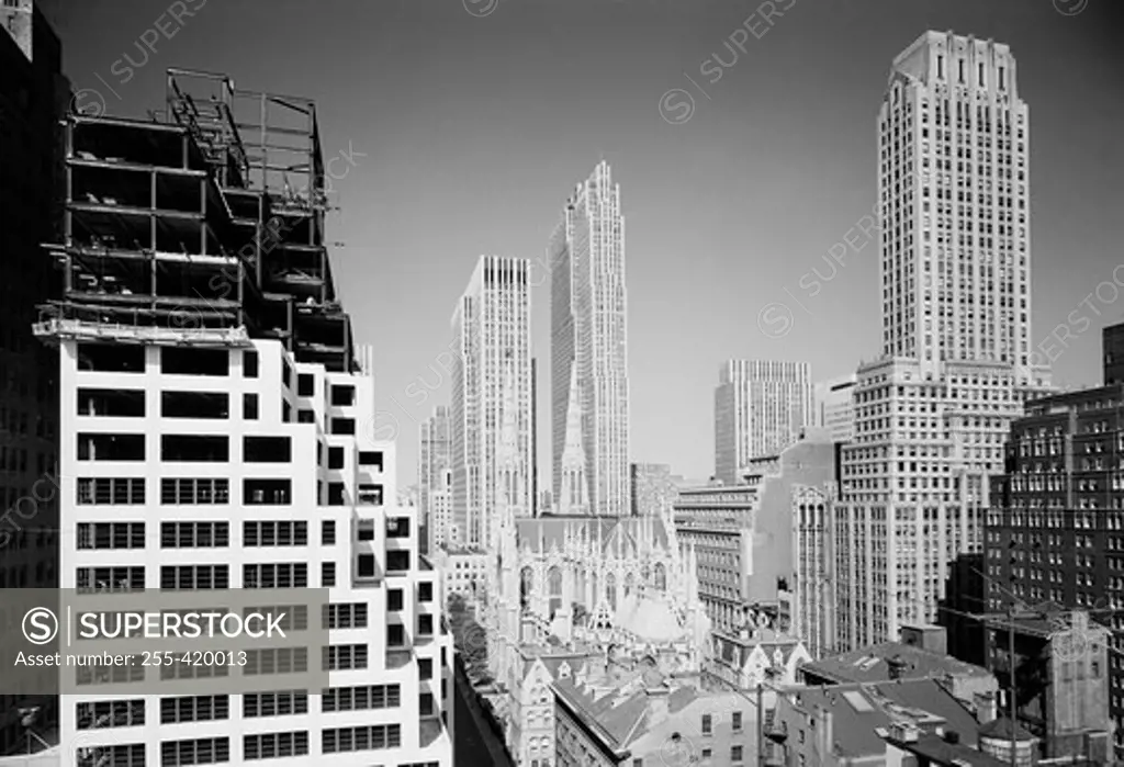 USA, New York State, New York City, view over rooftops toward Rockefeller Center and St. Patricks Cathedral from vicinity of Park Avenue