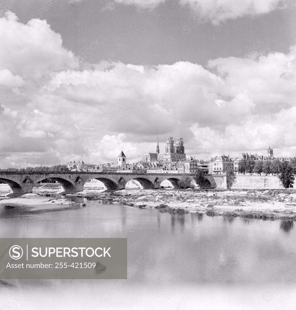 Stock Photo: 255-421509 France, Orleans, Arch bridge with river Loire
