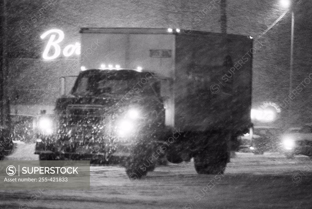 Stock Photo: 255-421833 Truck in blizzard at night