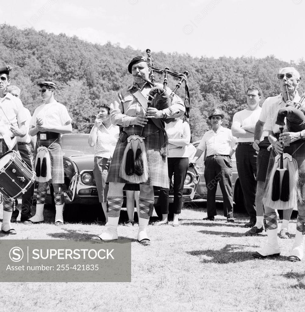 Stock Photo: 255-421835 Men playing bagpipes
