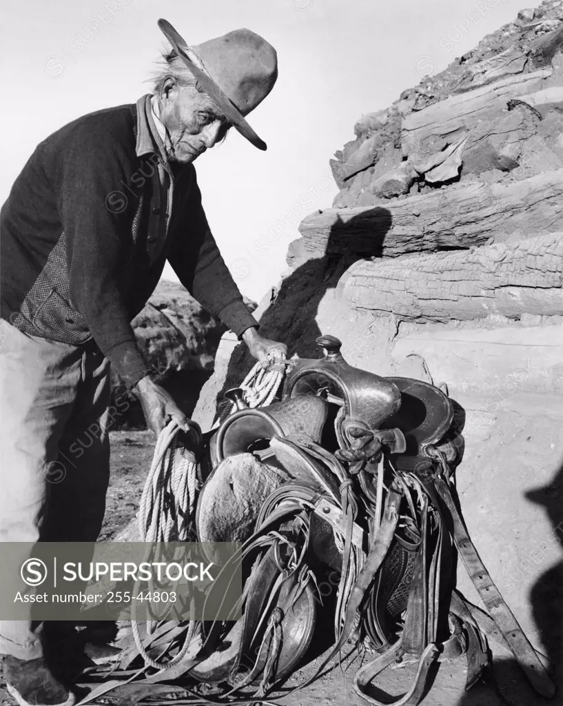 Navajo man holding a rope