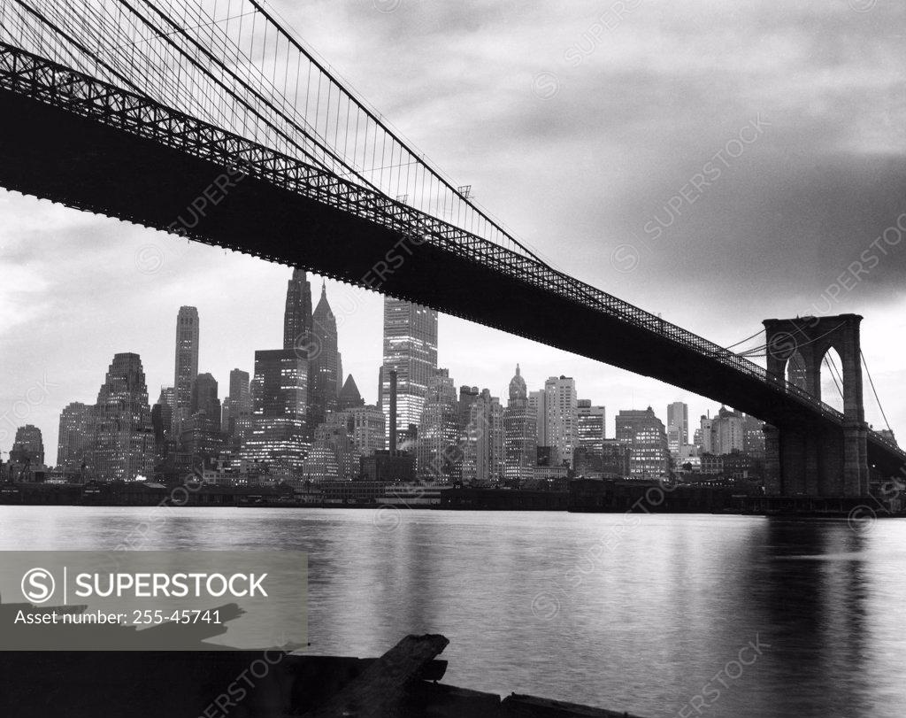 Stock Photo: 255-45741 Suspension bridge across a river, Brooklyn Bridge, New York City, New York, USA