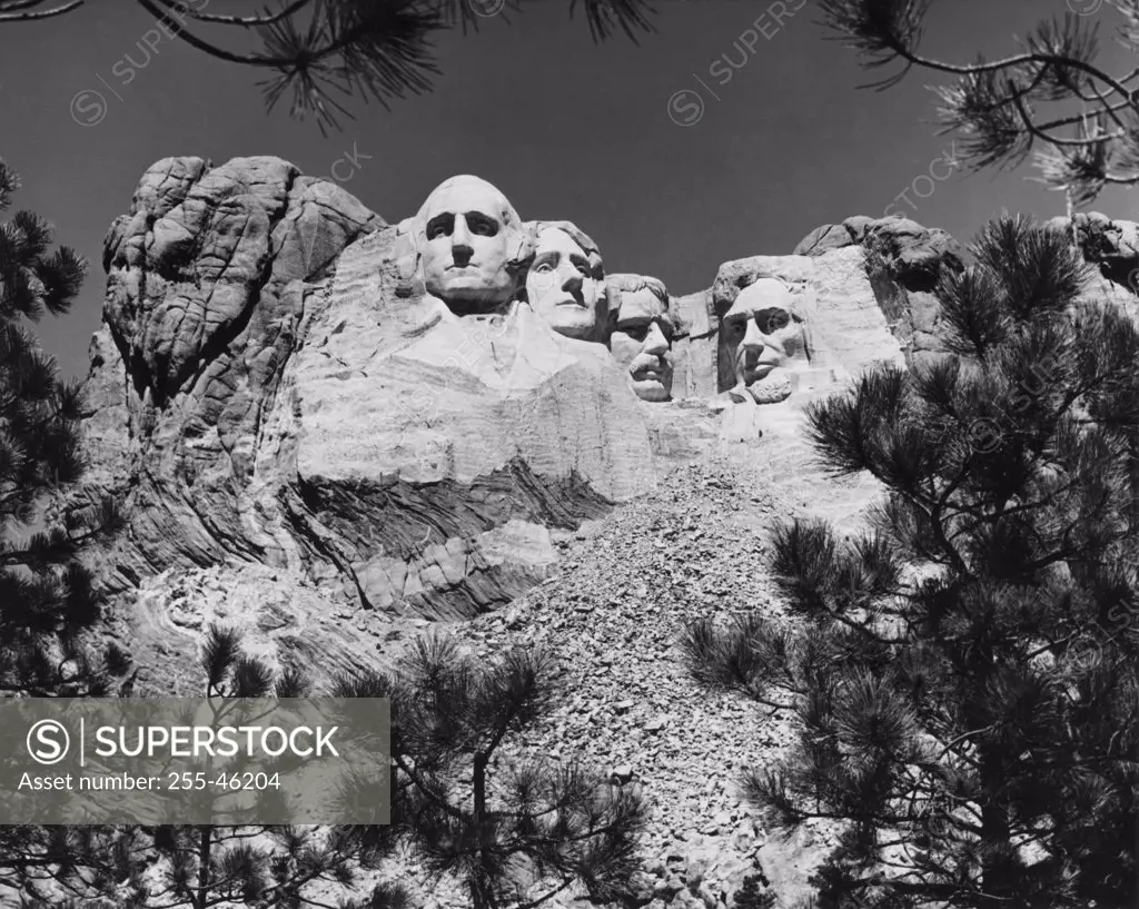 USA, South Dakota, Mount Rushmore National Memorial, low angle view of sculptures of US Presidents carved in mountain