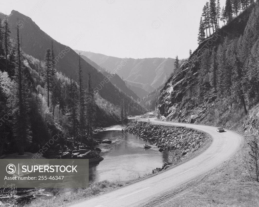 Stock Photo: 255-46347 Road along a river, Lolo Pass, Idaho, USA