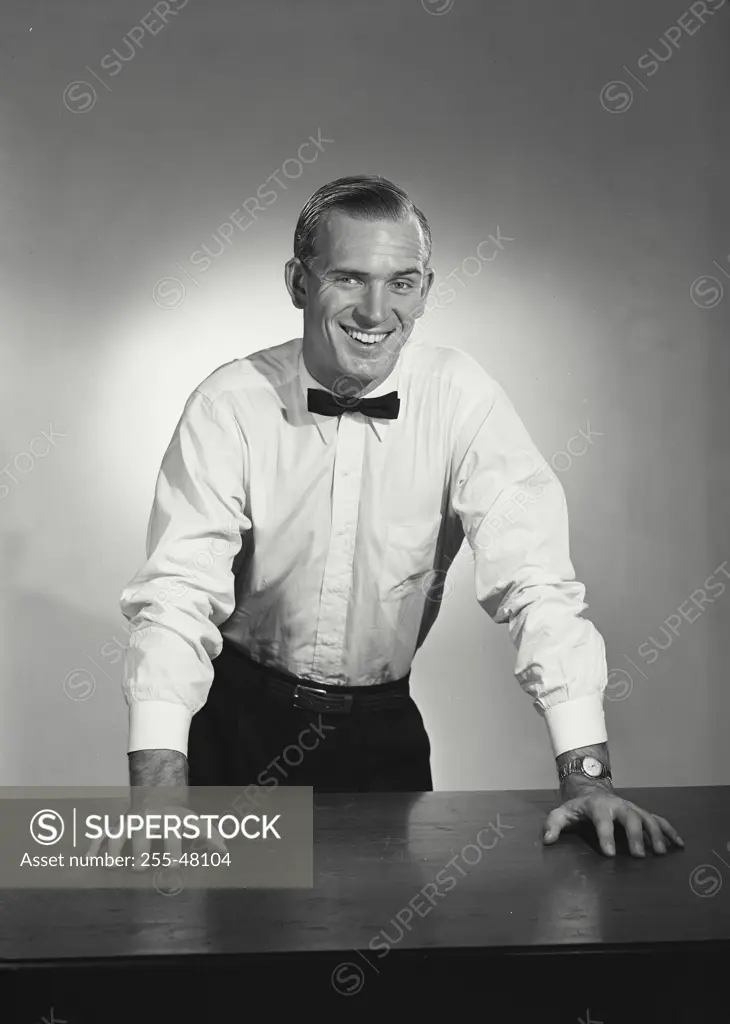 Studio portrait of businessman smiling