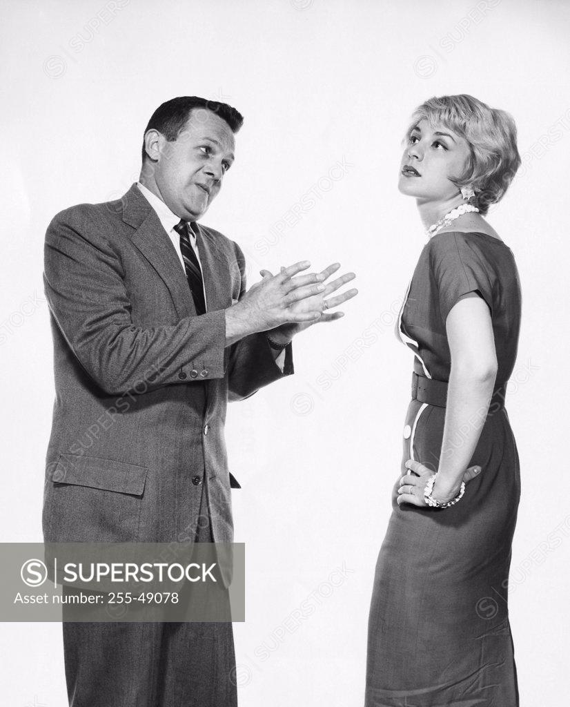 Stock Photo: 255-49078 Young man arguing with a young woman