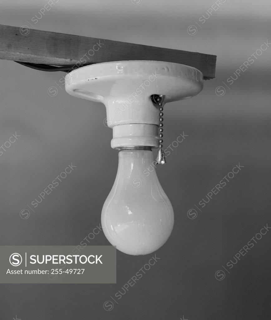 Stock Photo: 255-49727 Close-up of a lit light bulb