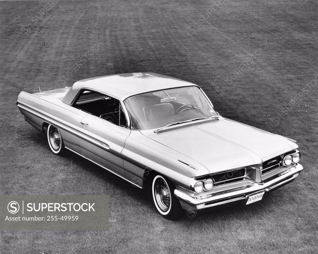 Stock Photo: 255-49959 High angle view of a car on a landscape, 1962 Pontiac