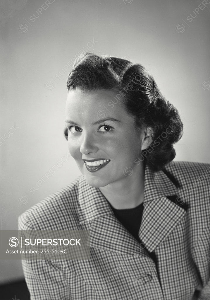 Stock Photo: 255-5109C Portrait of young woman smiling
