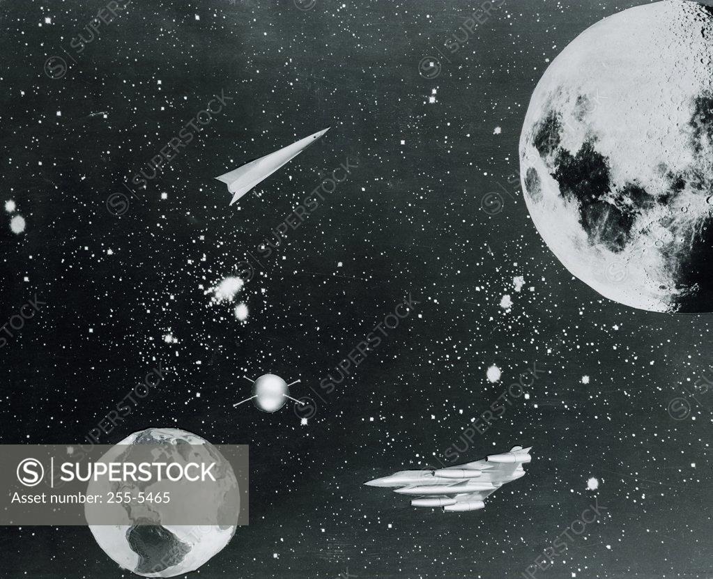 Stock Photo: 255-5465 Spaceships traveling between planet Earth and moon