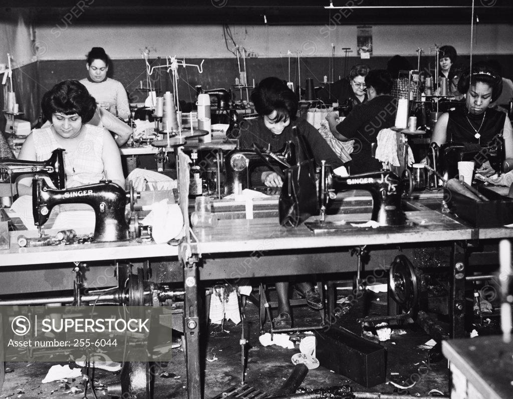 Stock Photo: 255-6044 Group of female workers in a textile factory