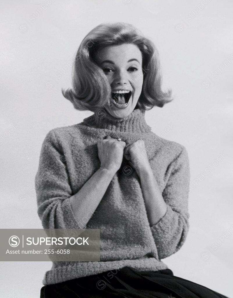 Stock Photo: 255-6058 Portrait of a young woman looking surprised