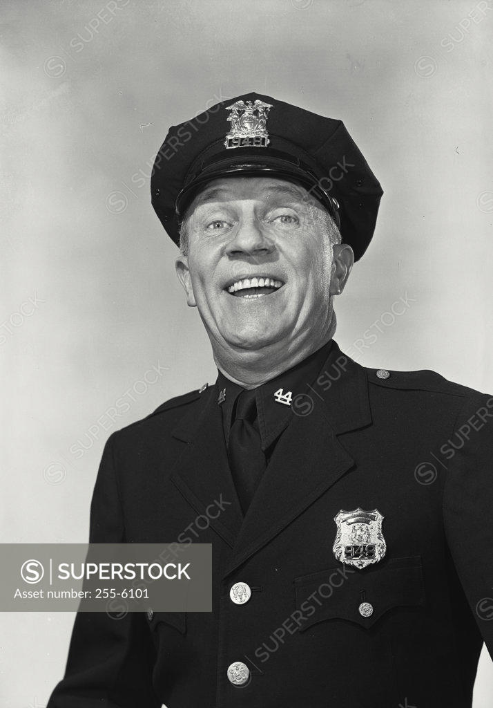 Stock Photo: 255-6101 Portrait of a police officer smiling
