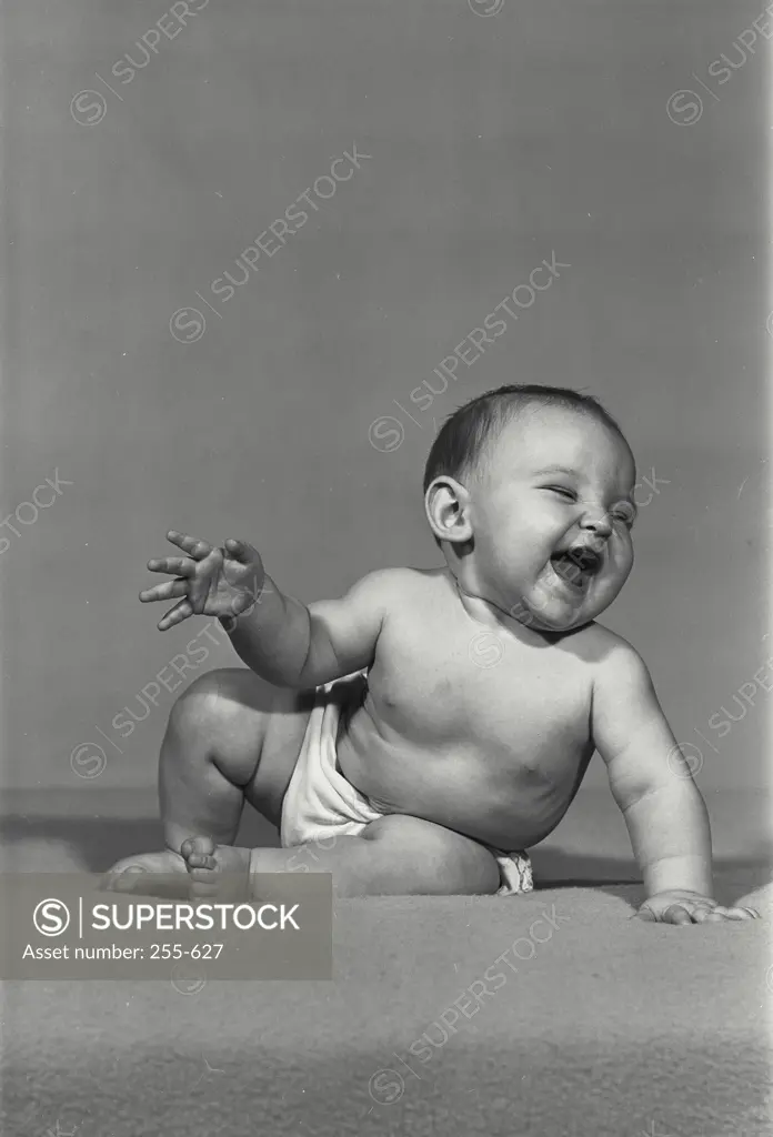 Close-up of a baby laughing
