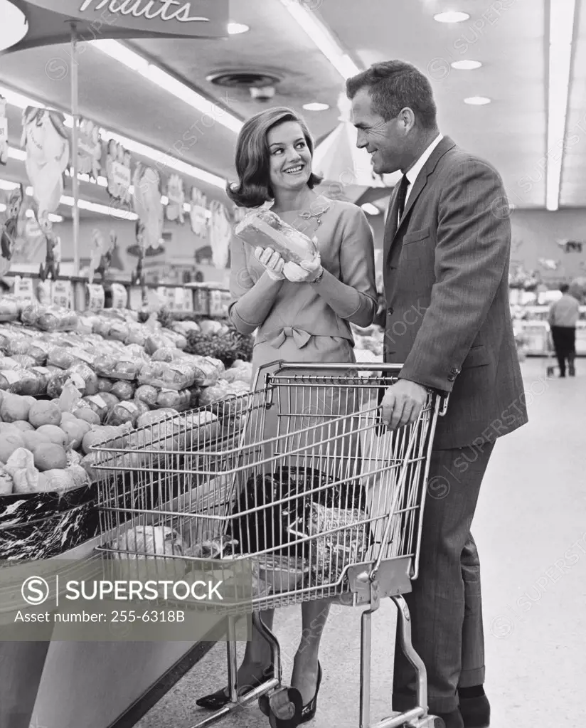 Mid adult couple shopping in a supermarket