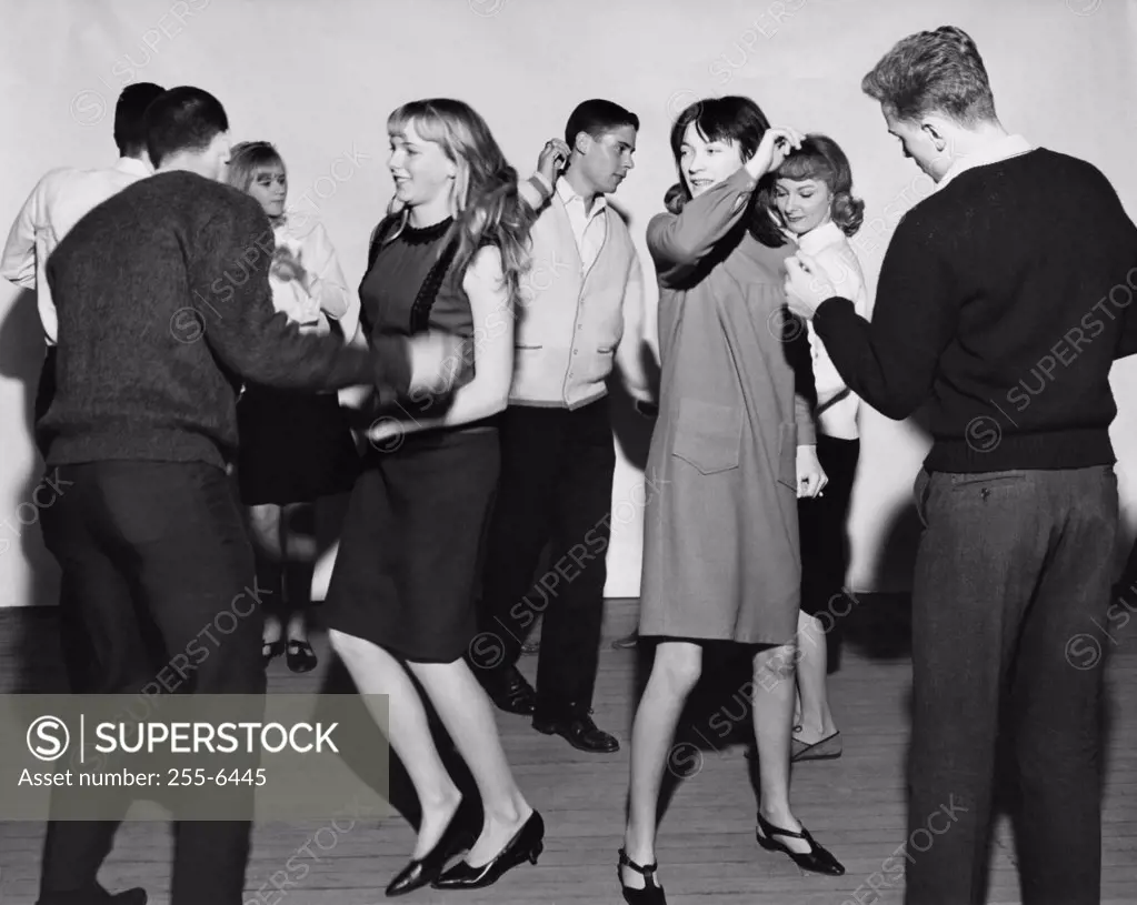 Group of teenagers dancing at party