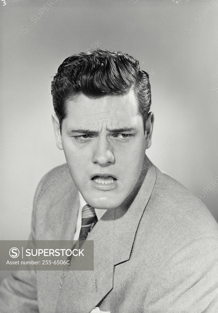 Stock Photo: 255-6506C Close-up of a businessman looking shocked
