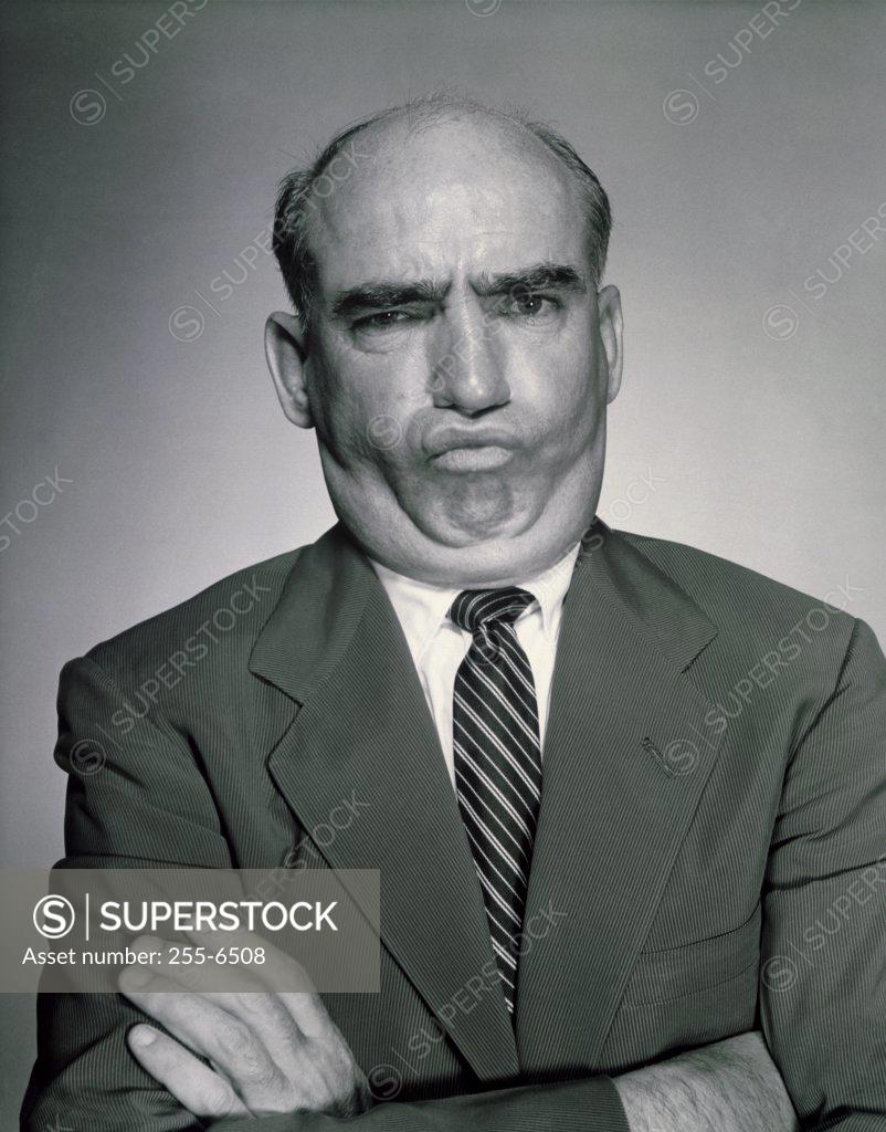 Stock Photo: 255-6508 Portrait of mature man making face