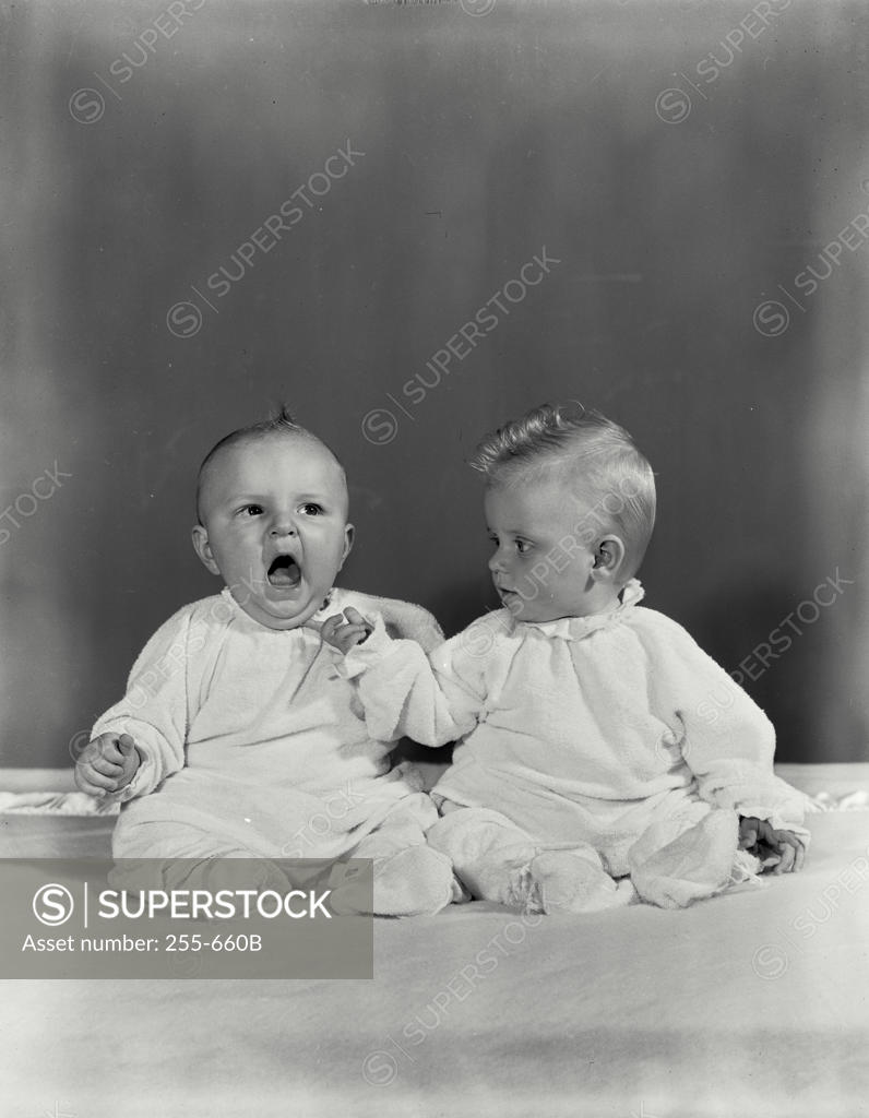 Stock Photo: 255-660B Two babies sitting together
